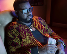 Im Bild: Theft Auto VI-Charakter Boobie Ike hält ein Bündel Bargeld.